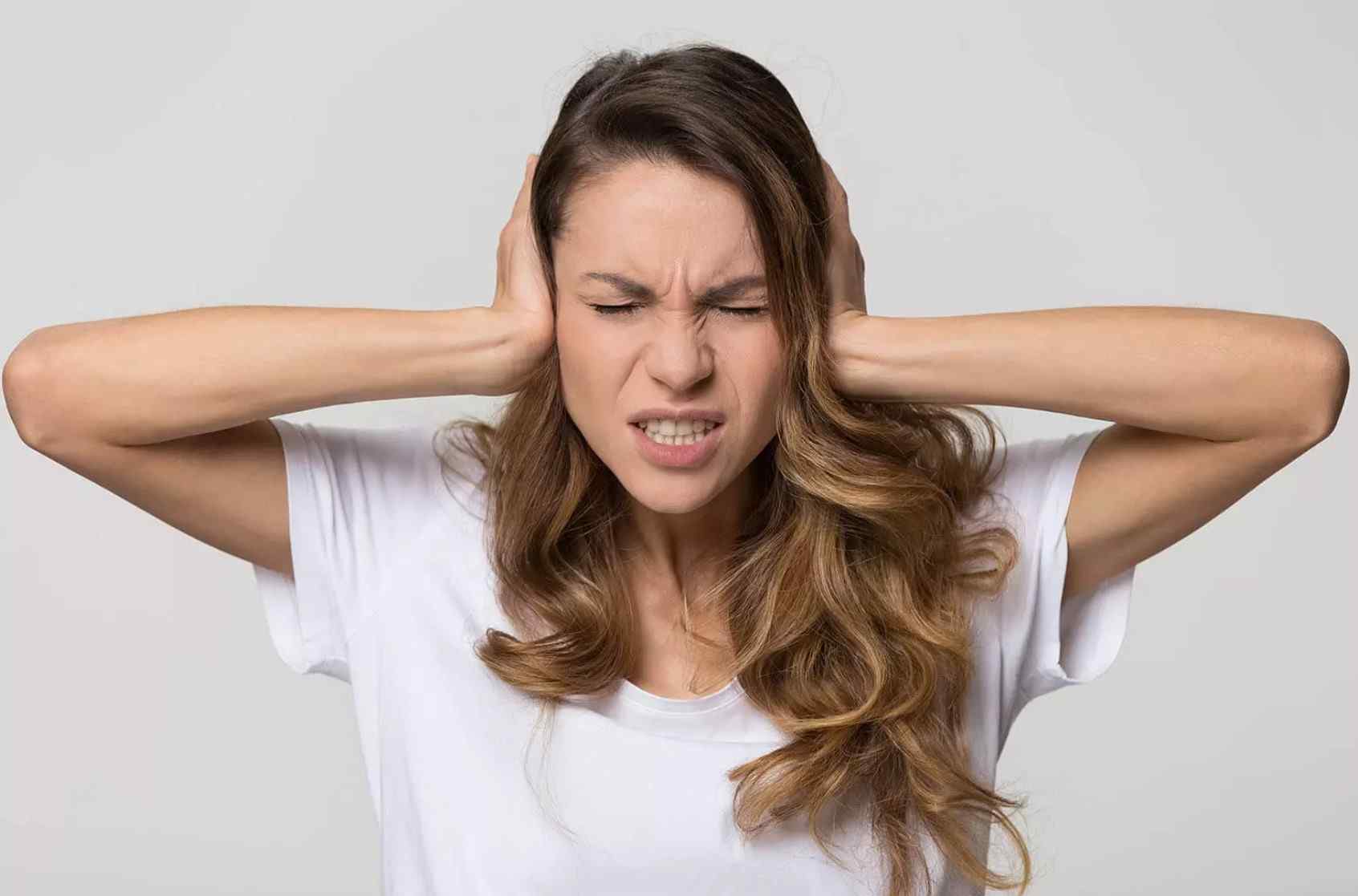 Extended exposure to loud noise, or damage to small hair cells in the inner ear, causes Tinnitus.